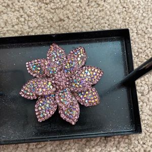 Lavender pin which can be worn on a heavy chain